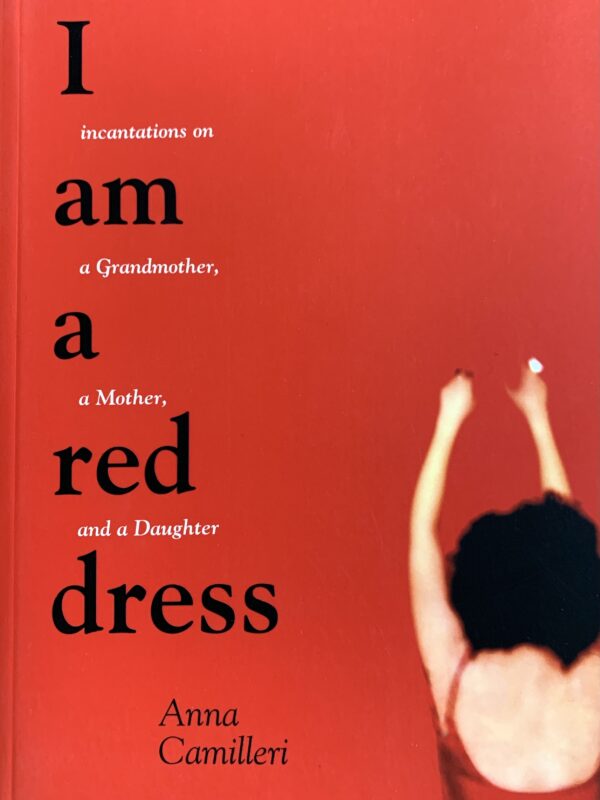 Book cover containing a woman in a red dress, arms above her head. Text reads, “I am a red dress: incantations on a Grandmother, a Mother, and a Daughter”.